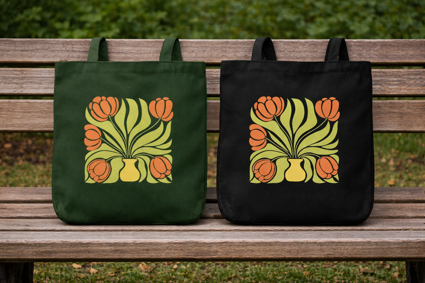 A woman in a beige shirt and green pants carries the Tulip Muse Tote by A Heartee Affair—a black cotton canvas bag with an orange tulip and green leaf design—while outdoors in an urban setting.
